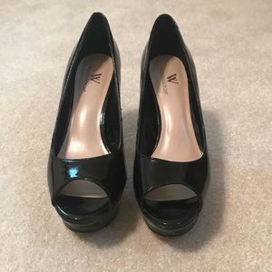 Black patten leather peep toe stilettos